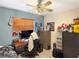 Bedroom with desk, chair, and dresser at 4099 30Th N St, St Petersburg, FL 33714