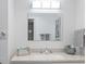 Bathroom features a vanity with a speckled countertop at 4316 Tahitian Gardens Cir # H, Holiday, FL 34691