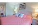 Relaxing bedroom with a king-size bed and soft colors at 4316 Tahitian Gardens Cir # H, Holiday, FL 34691