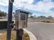 Gated community entrance with security keypad at 4316 Tahitian Gardens Cir # H, Holiday, FL 34691