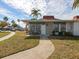 Neat and charming mid-century home with a small patio at 4316 Tahitian Gardens Cir # H, Holiday, FL 34691