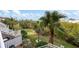 Private patio with lush landscaping and a view of the community grounds at 4334 Spinnaker Cove Ln, Tampa, FL 33615