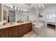 Elegant bathroom with double vanity and garden tub at 4334 Spinnaker Cove Ln, Tampa, FL 33615