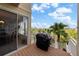 Spacious deck with a built-in grill and sliding glass doors leading to the dining area at 4334 Spinnaker Cove Ln, Tampa, FL 33615