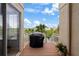 Deck with built-in grill and stairs leading to the backyard at 4334 Spinnaker Cove Ln, Tampa, FL 33615