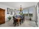 Bright dining room with a rustic wooden table and chandelier at 4334 Spinnaker Cove Ln, Tampa, FL 33615