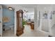 Grand entryway with half bath, views to living area and upper level at 4334 Spinnaker Cove Ln, Tampa, FL 33615