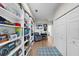 Bright hallway with spacious bookcases and a cozy reading nook at 4334 Spinnaker Cove Ln, Tampa, FL 33615