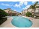 Community pool with plenty of lounge chairs for sunbathing at 4334 Spinnaker Cove Ln, Tampa, FL 33615