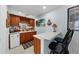 Wet bar with wood cabinets, wine rack, and mini-fridge at 4334 Spinnaker Cove Ln, Tampa, FL 33615