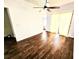 Bright bedroom features hardwood floors and natural light from the window at 4405 W Fair Oaks Ave # 10, Tampa, FL 33611