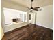 Bedroom with hardwood floors and ceiling fan at 4405 W Fair Oaks Ave # 10, Tampa, FL 33611