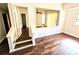 Hallway with hardwood floors and staircase at 4405 W Fair Oaks Ave # 10, Tampa, FL 33611