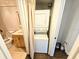 Stackable washer and dryer in laundry closet at 4405 W Fair Oaks Ave # 10, Tampa, FL 33611