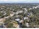 Aerial view of a residential neighborhood, showcasing a variety of homes and lush landscaping at 4408 W Leona St, Tampa, FL 33629