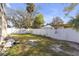 Large backyard area with white vinyl fence at 4408 W Leona St, Tampa, FL 33629