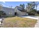 Contemporary two-story home with attached garage and expansive yard at 4408 W Leona St, Tampa, FL 33629