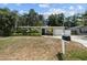 House exterior with a neatly landscaped yard and mailbox at 4822 W Bay Court Ave, Tampa, FL 33611