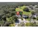 Aerial view of house and surrounding landscape at 4996 Felecity Way, Palm Harbor, FL 34685