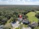 Aerial view showcasing home's location and neighborhood at 4996 Felecity Way, Palm Harbor, FL 34685