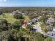 Aerial view showing home's setting in neighborhood at 4996 Felecity Way, Palm Harbor, FL 34685