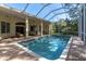 Spacious pool and lanai area, perfect for entertaining at 4996 Felecity Way, Palm Harbor, FL 34685