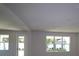 Bright living area with large windows and backyard access at 507 N Bradford Ave, Tampa, FL 33609