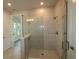 Spacious shower with glass enclosure and modern tile at 507 N Bradford Ave, Tampa, FL 33609