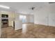 Kitchen features stainless steel appliances and light-colored cabinetry at 5605 Tanagergrove Way, Lithia, FL 33547