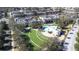 Aerial view of community with shops, park, and fountain at 6003 Tealside Ct, Lithia, FL 33547