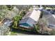 Aerial view of home and pool at 6003 Tealside Ct, Lithia, FL 33547