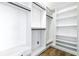 Large walk-in closet with ample shelving and hanging space at 6003 Tealside Ct, Lithia, FL 33547