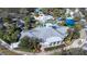 Aerial view of community clubhouse with gray roof and white columns at 6003 Tealside Ct, Lithia, FL 33547