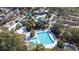 Aerial view of community pool complex with lap pool and water features at 6003 Tealside Ct, Lithia, FL 33547