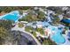 Aerial view of community pool with water features and lounge areas at 6003 Tealside Ct, Lithia, FL 33547