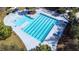 Aerial view of community lap pool with surrounding lounge area at 6003 Tealside Ct, Lithia, FL 33547