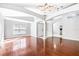 Living room with hardwood floors and a chandelier at 6003 Tealside Ct, Lithia, FL 33547