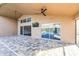 Covered patio with paver stones and sliding glass doors at 6003 Tealside Ct, Lithia, FL 33547