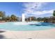 Community splash pad with surrounding green space at 6003 Tealside Ct, Lithia, FL 33547