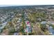 Aerial view showing a single-Gathering home with a pool in a residential neighborhood at 6170 7Th N Ave, St Petersburg, FL 33710