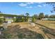 Large backyard with grass and trees at 6170 7Th N Ave, St Petersburg, FL 33710