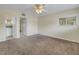 Spacious bedroom with carpet and ceiling fan at 6170 7Th N Ave, St Petersburg, FL 33710