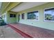 Front porch with tiled flooring and a view of the front yard at 6170 7Th N Ave, St Petersburg, FL 33710