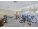 Living room with tiled floors, fireplace, and plenty of natural light at 6170 7Th N Ave, St Petersburg, FL 33710