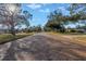 Brick paved street lined with lush trees and homes at 6170 7Th N Ave, St Petersburg, FL 33710