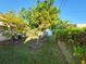 Landscaped backyard with various trees and plants at 6190 107Th N Ave, Pinellas Park, FL 33782