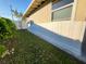 Home exterior showing side yard and landscaping at 6190 107Th N Ave, Pinellas Park, FL 33782