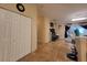 Home hallway with double door closet and view to dining room at 6190 107Th N Ave, Pinellas Park, FL 33782