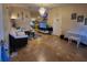 Living room with tiled floor, white sofas, and a chandelier at 6190 107Th N Ave, Pinellas Park, FL 33782