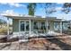 Newly renovated home with covered porch at 6629 Travis Blvd, Tampa, FL 33610